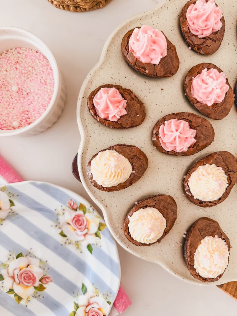 tray of deviled brownies with bowl of sprinkles