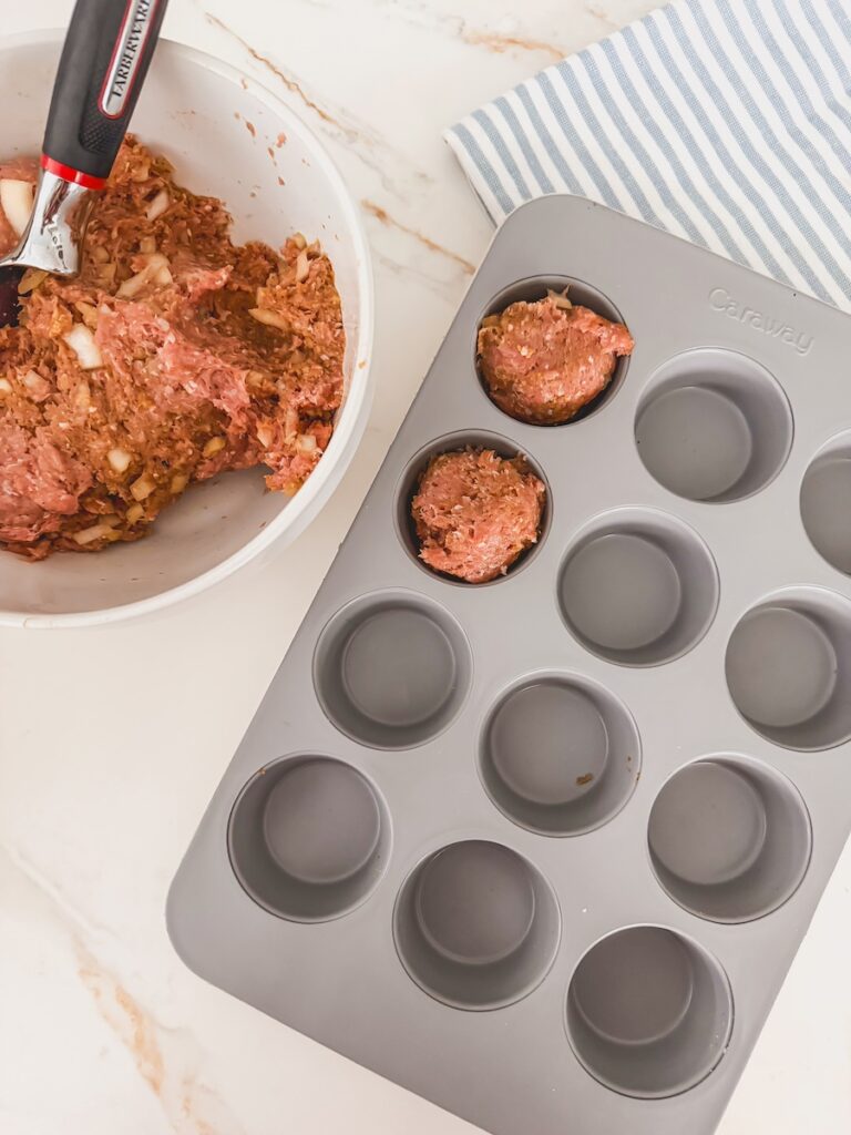 one scoop of meat in muffin tin