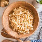 fettuccini Alfredo in wooden bowl