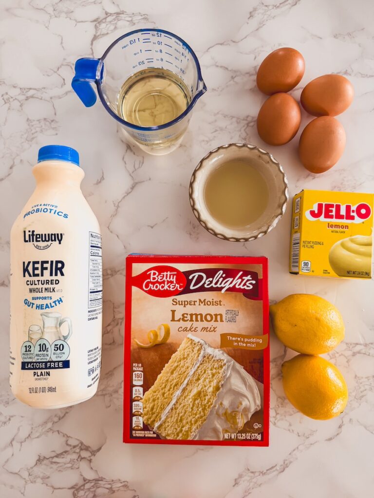 lemon bundt cake ingredients on marble countertop