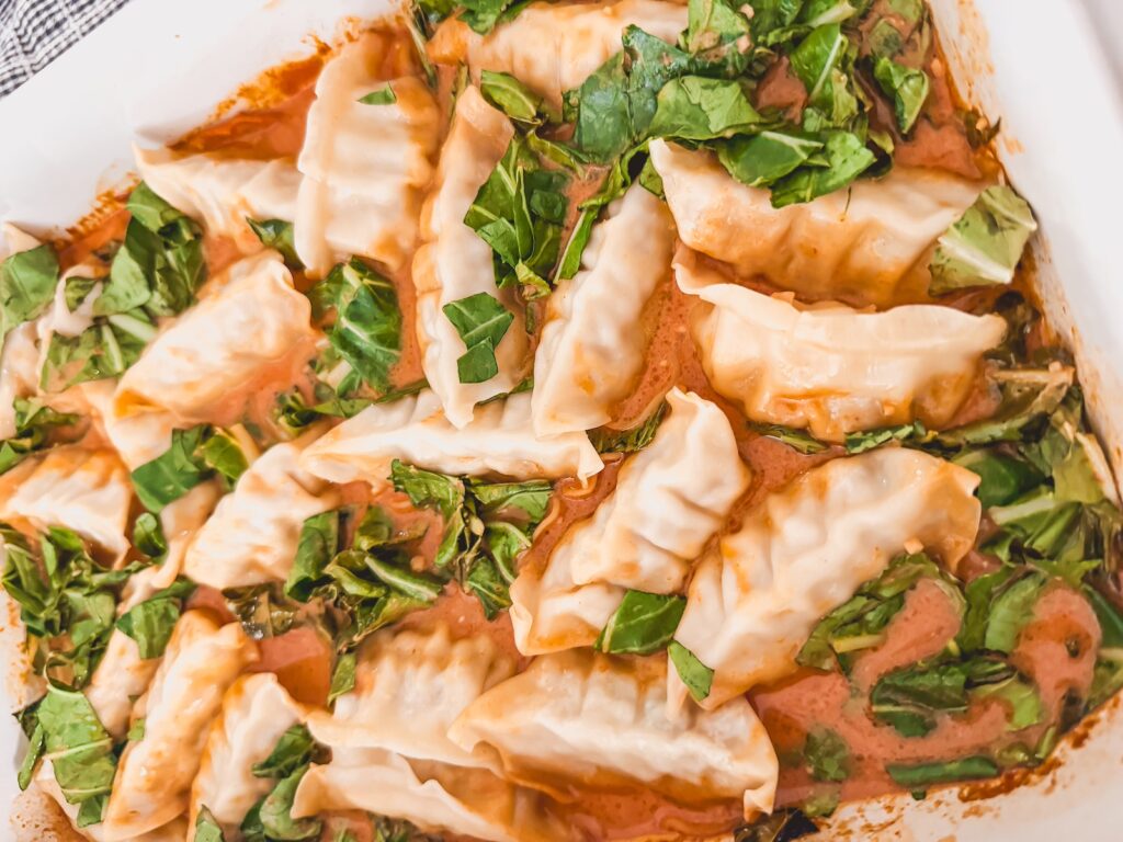 close up of one pan dumpling bake