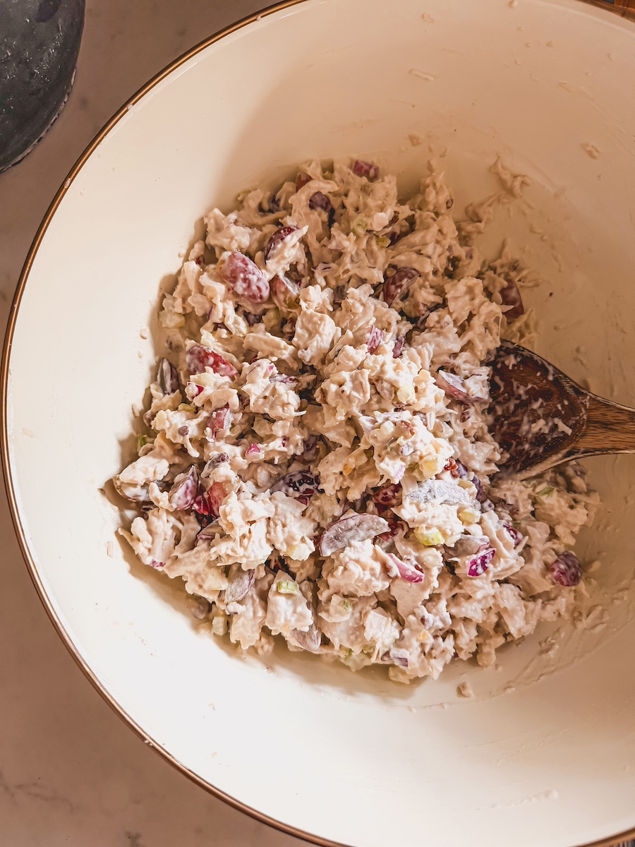chicken salad recipe with grapes in a white bowl