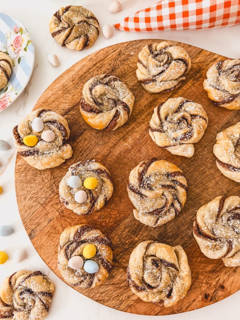 puff pastry nests on wood tray