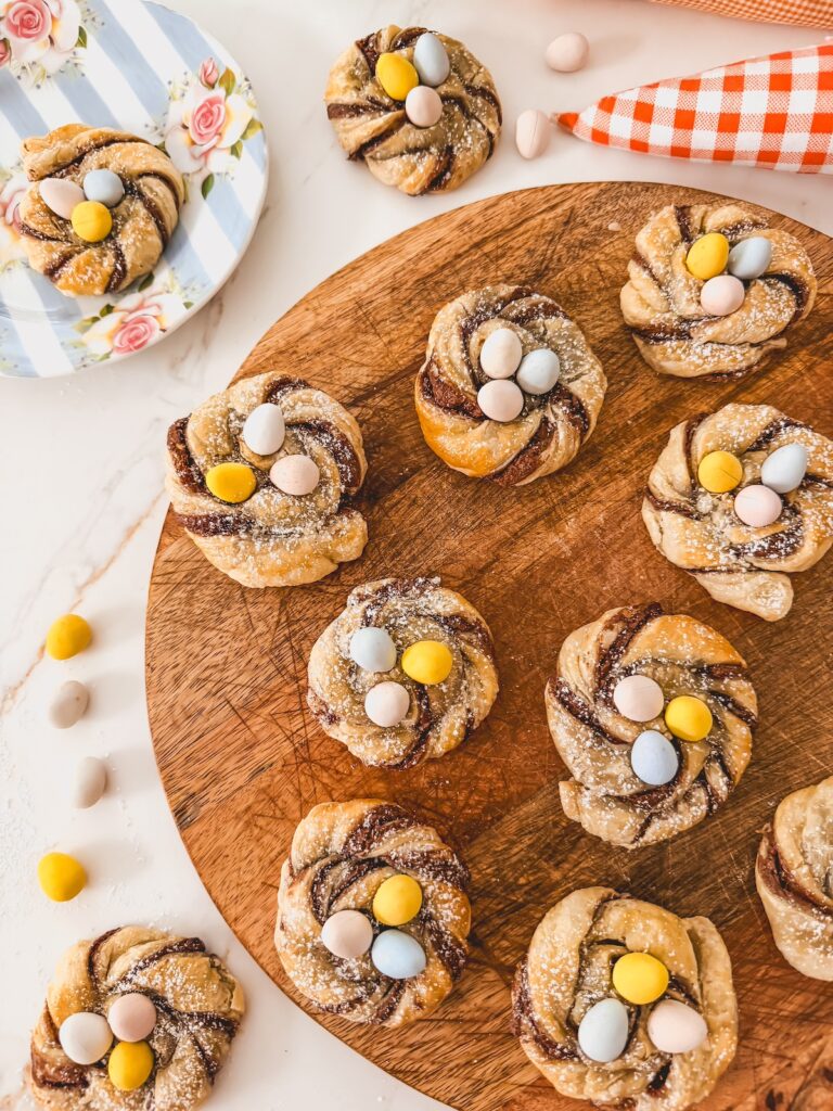 puff pastry nests on wood tray