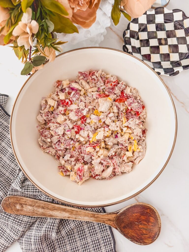 Italian grinder chicken salad with deli meats, cheese, and creamy tangy dressing