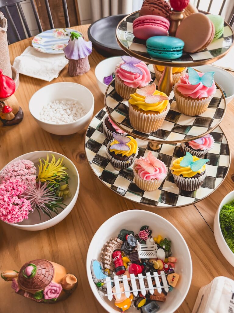 close up of fairy garden accessories in bowls