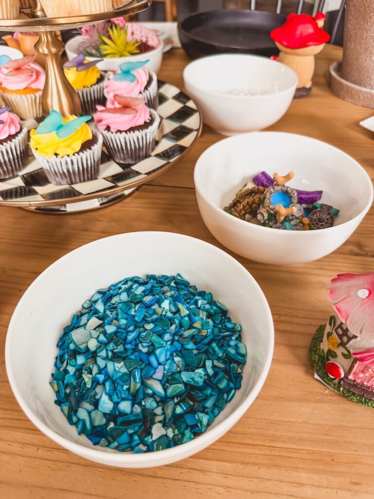 close up of fairy accessories on table