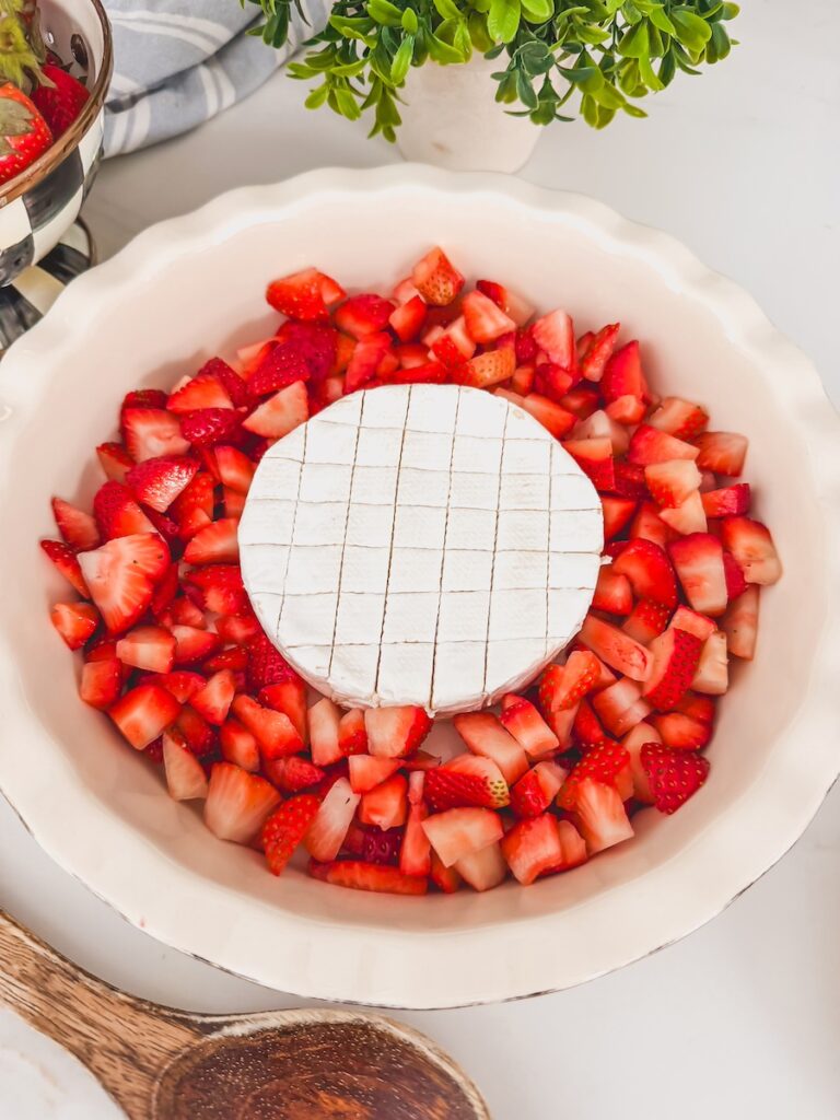 brie in baking dish with strawberries
