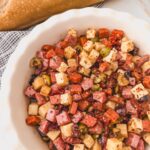 charcuterie dip next to fresh baked bread
