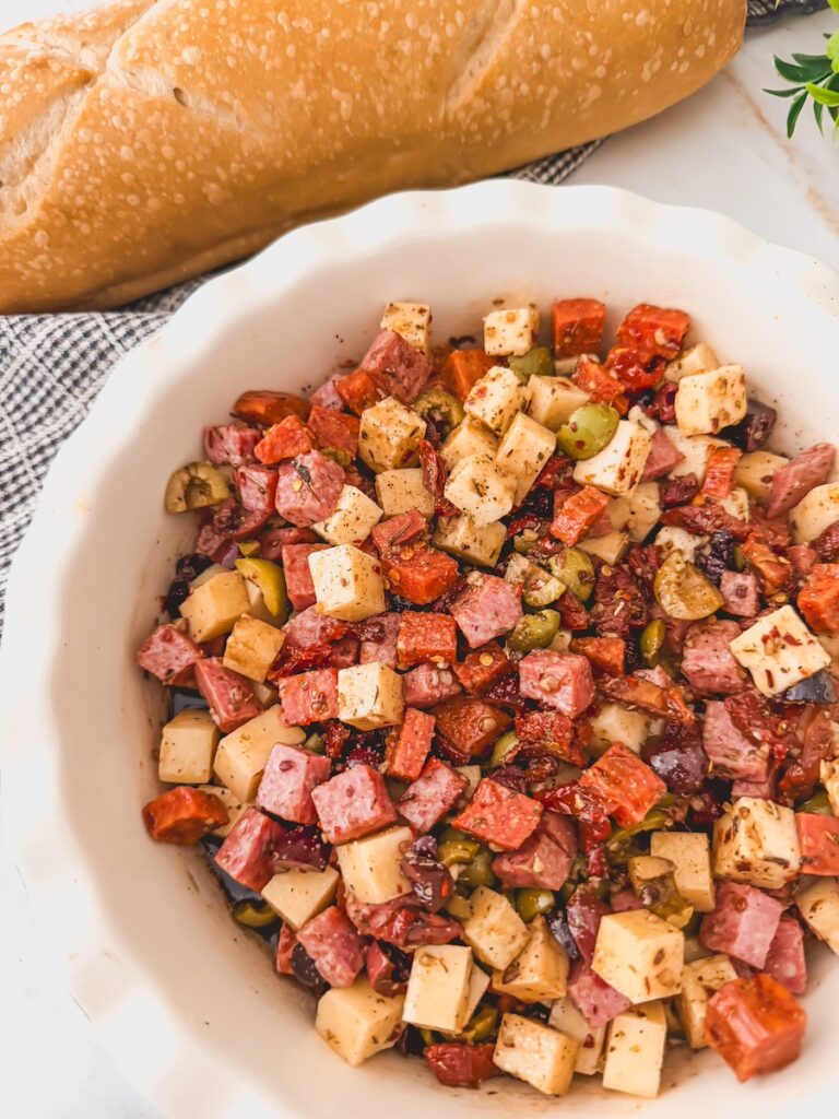 charcuterie dip next to fresh baked bread