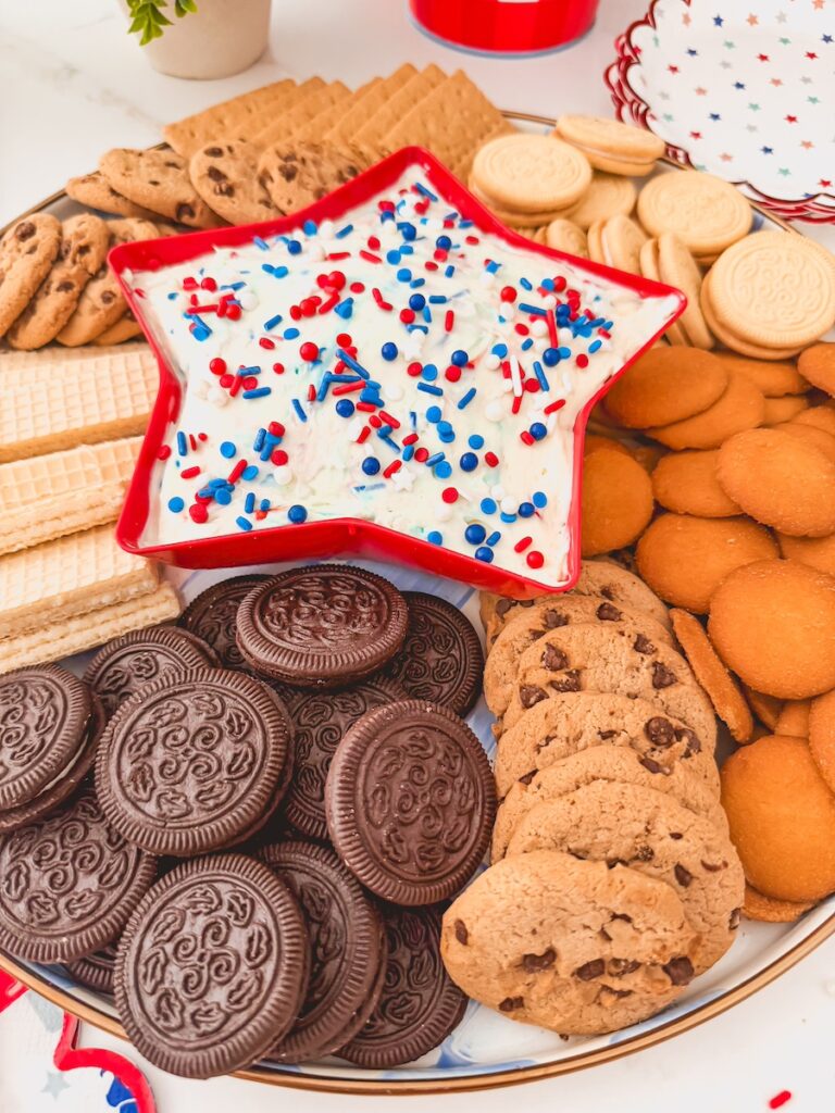 close up side view of funfetti dip in star plate for patriotic holiday 4th of july