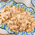 A platter with lemon zucchini ricotta pasta.