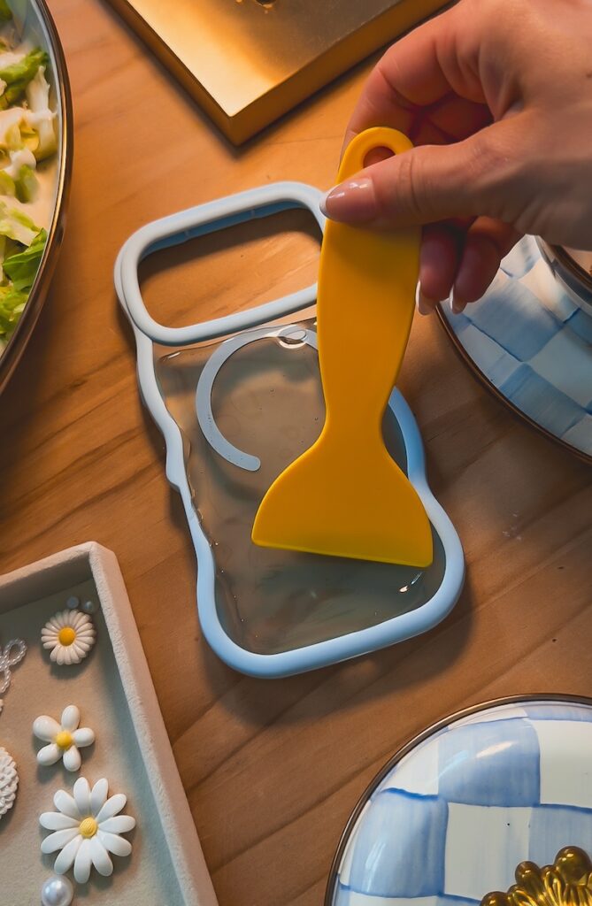 smoothing and removing air bubbles from resin