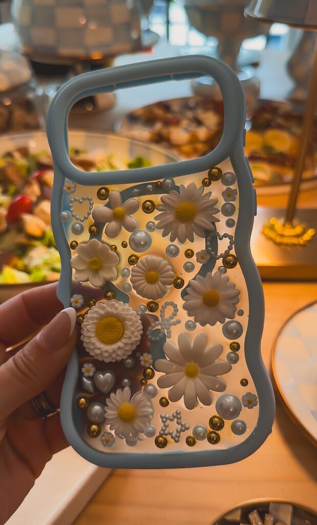 finished diy resin phone case with flowers and pearls