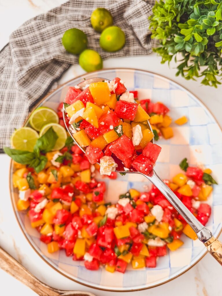 scoop full of watermelon peach feta salad