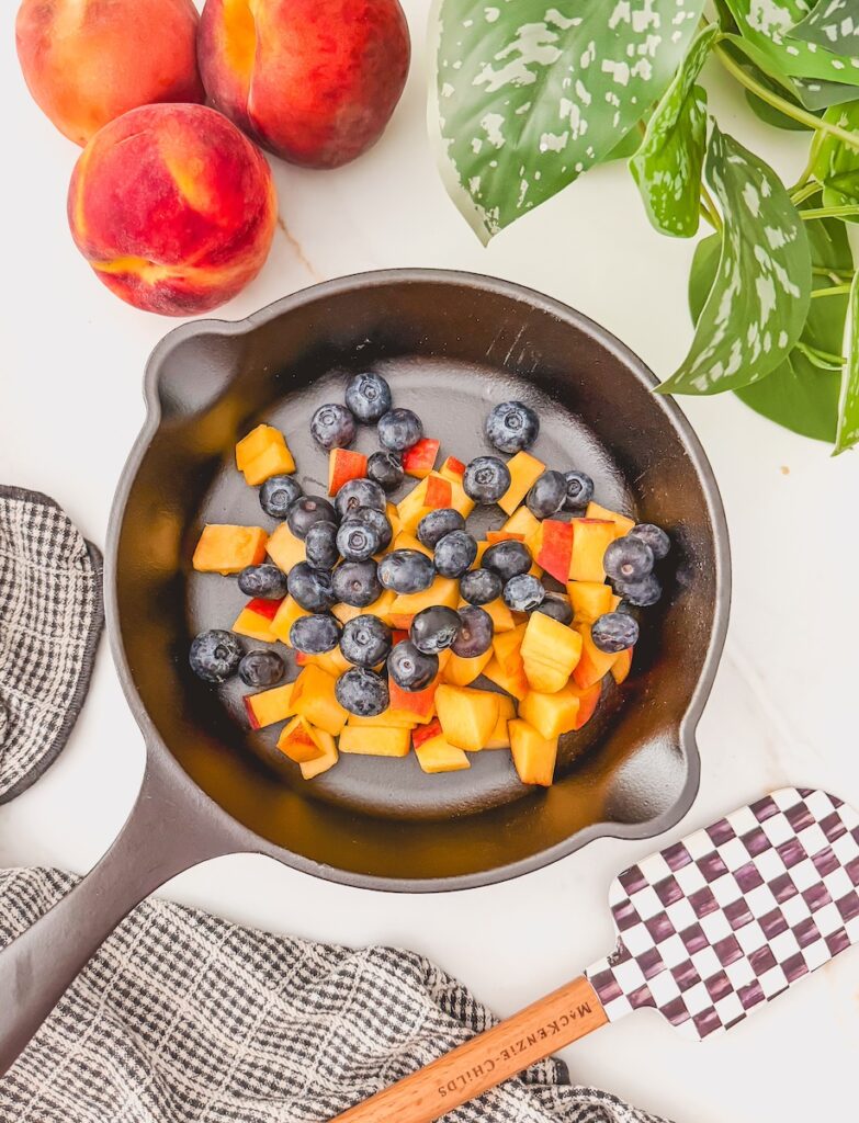 blueberries and peaches In skillet