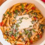 one pan tomato and pasta bake with fresh basil and parmesan cheese