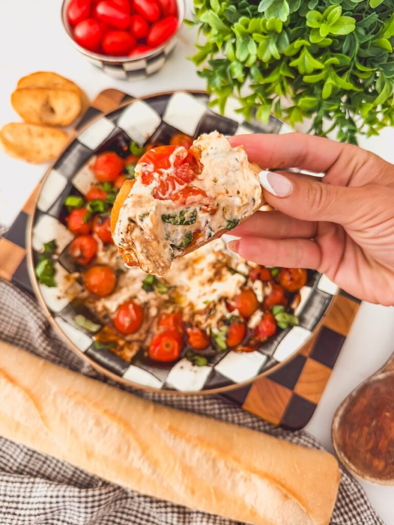 creamy boursin and tomato on top of crostini
