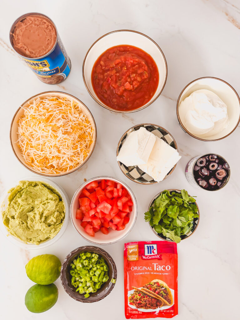 Ingredients for layered taco dip.