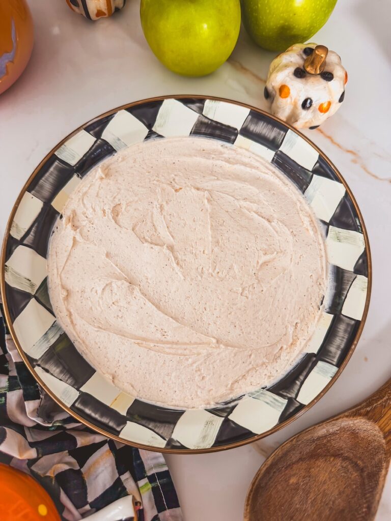 cheesecake layer spread out in shallow baking dish