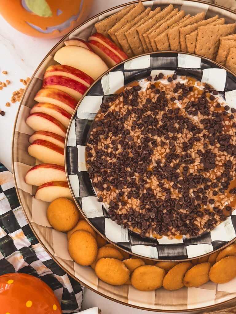 close up of apples served along side caramel apple dip