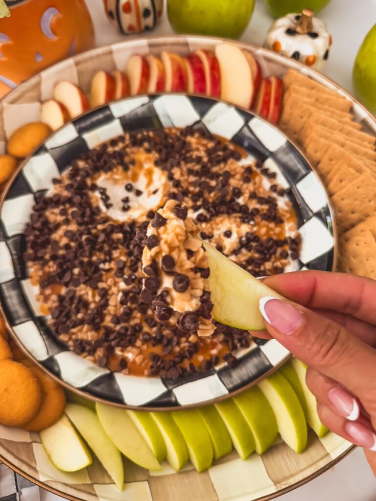 apple scooped in cheesecake dip