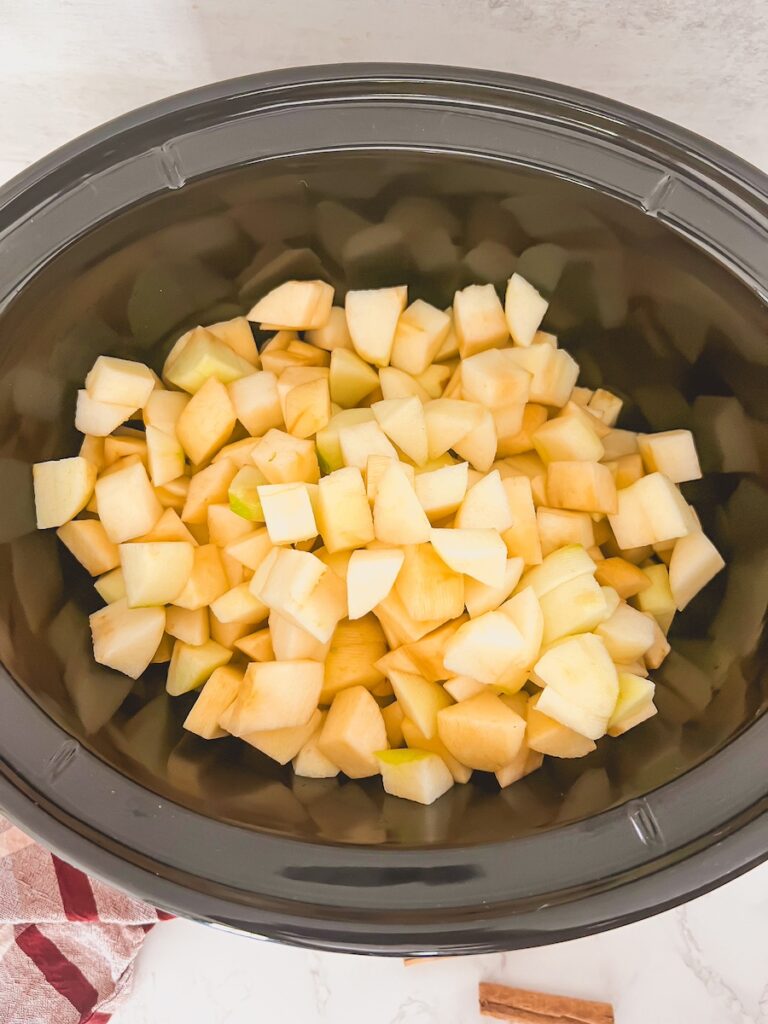 diced uncooked apples in slow cooker