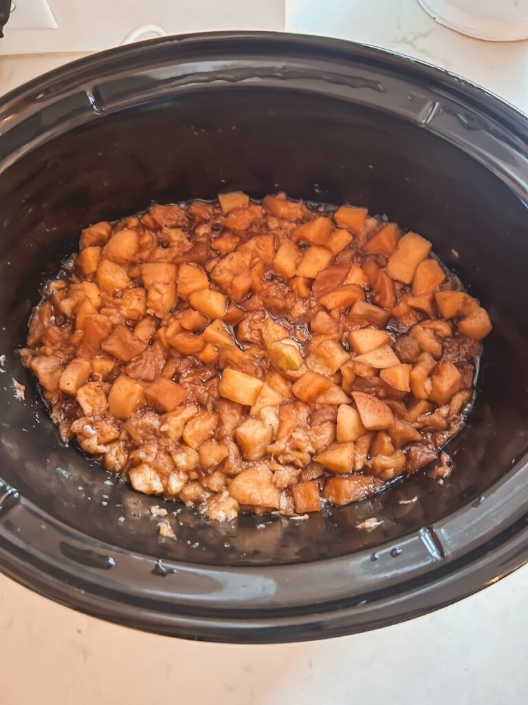 cooked apples, puree and spices cooked down in base of slow cooker