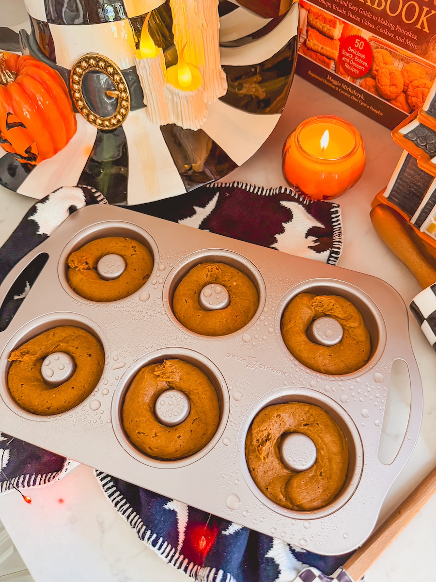 pumpkin batter piped in donut pan