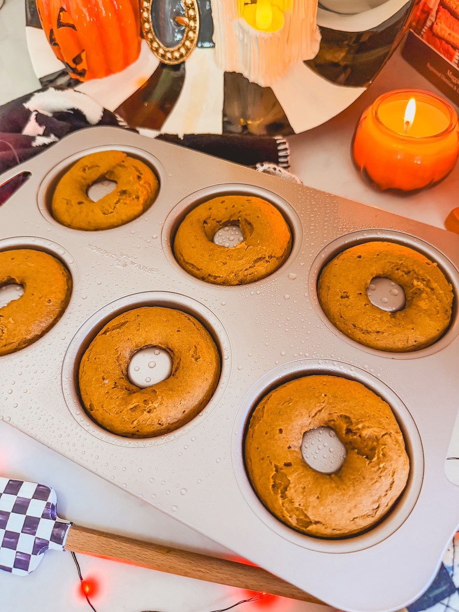 pumpkin batter piped in donut pan