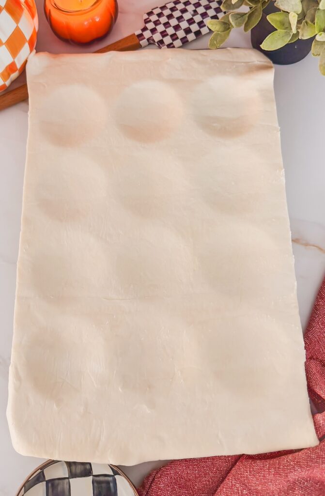 puff pastry over muffin tin