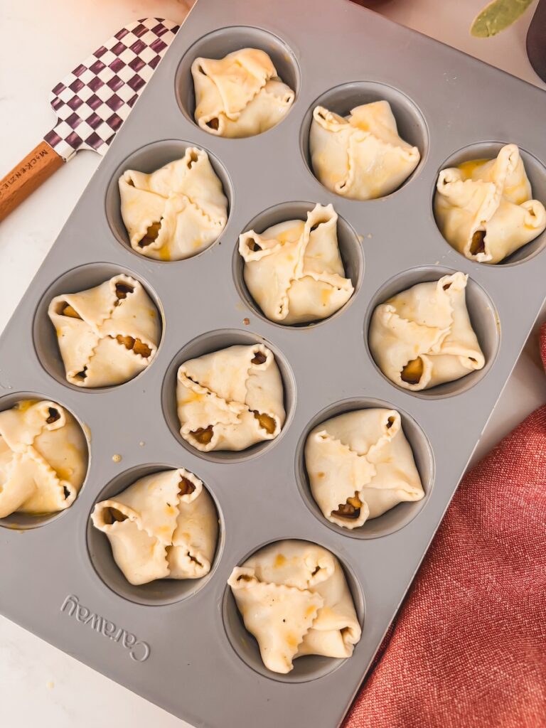 puff pastry folded over apple pie filling