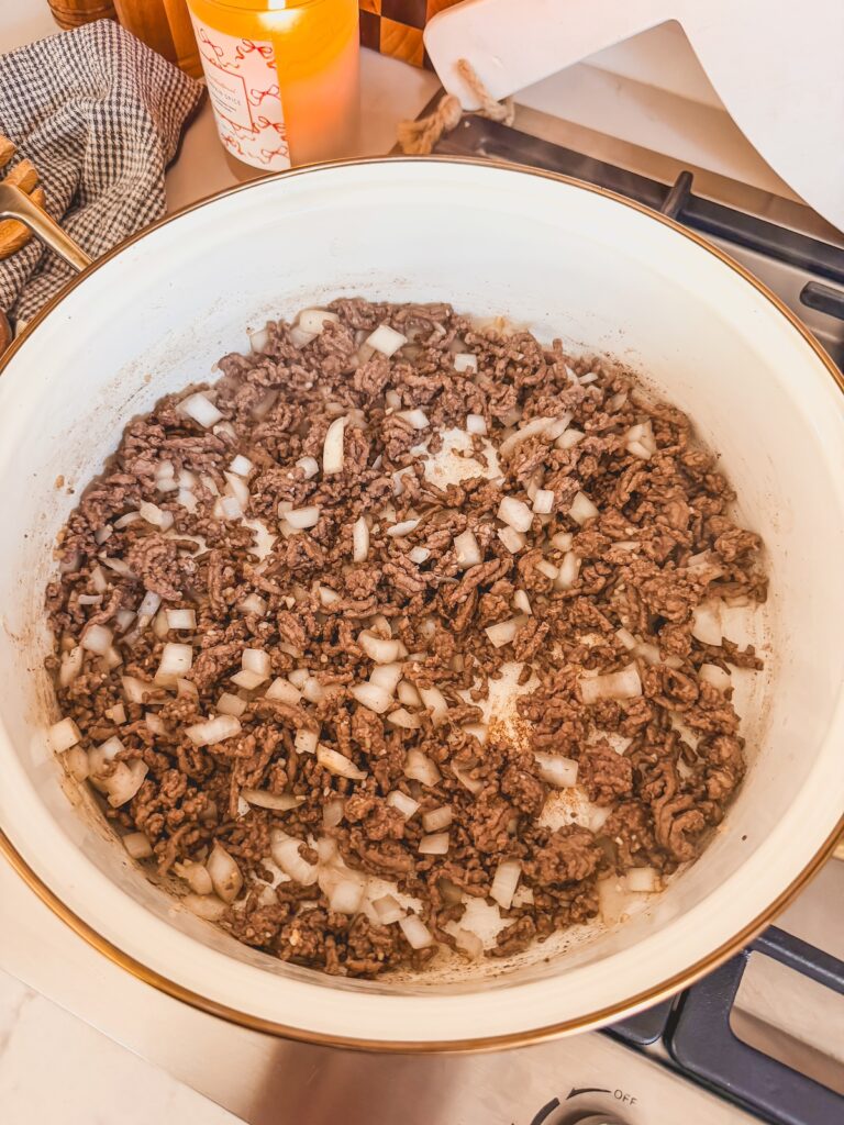 ground beef and onion in skillet