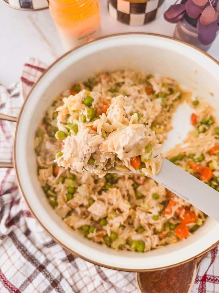 spoon full of chicken pot pie orzo one pan skillet dinner