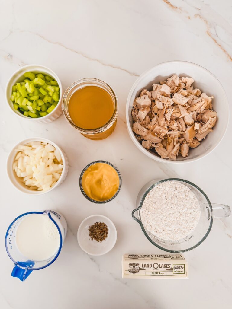 chicken and dumpling casserole ingredients on white counter