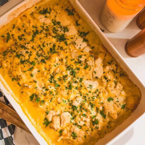 overhead shot of chicken and dumpling casserole topped with parsley
