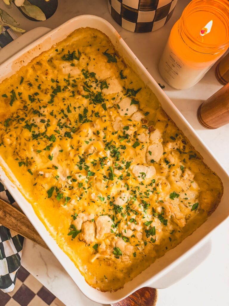 overhead shot of chicken and dumpling casserole topped with parsley