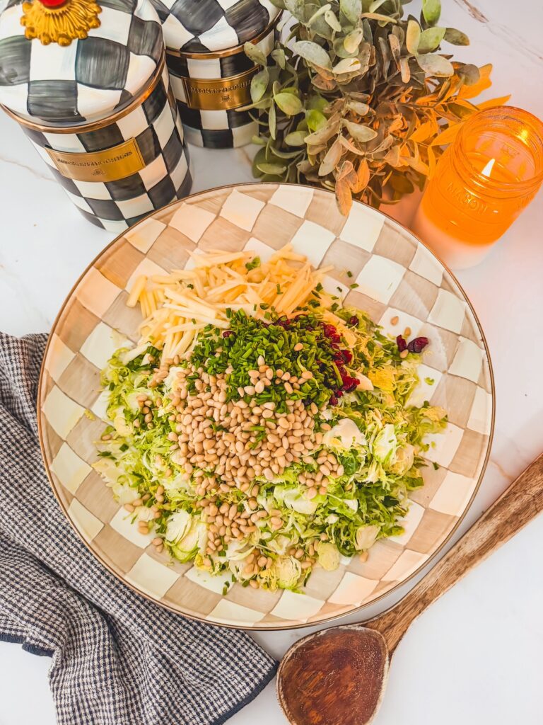 nuts, herbs, cheese added to salad