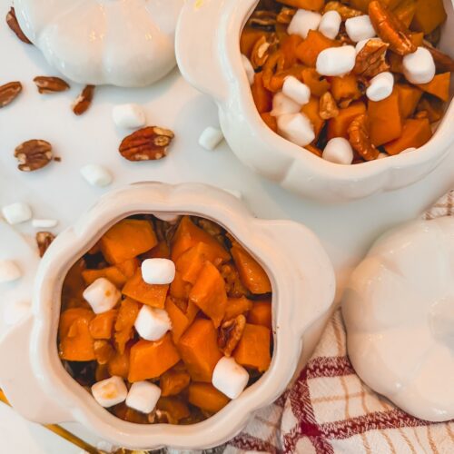 sweet potato casserole in two small white pumpkin dishes