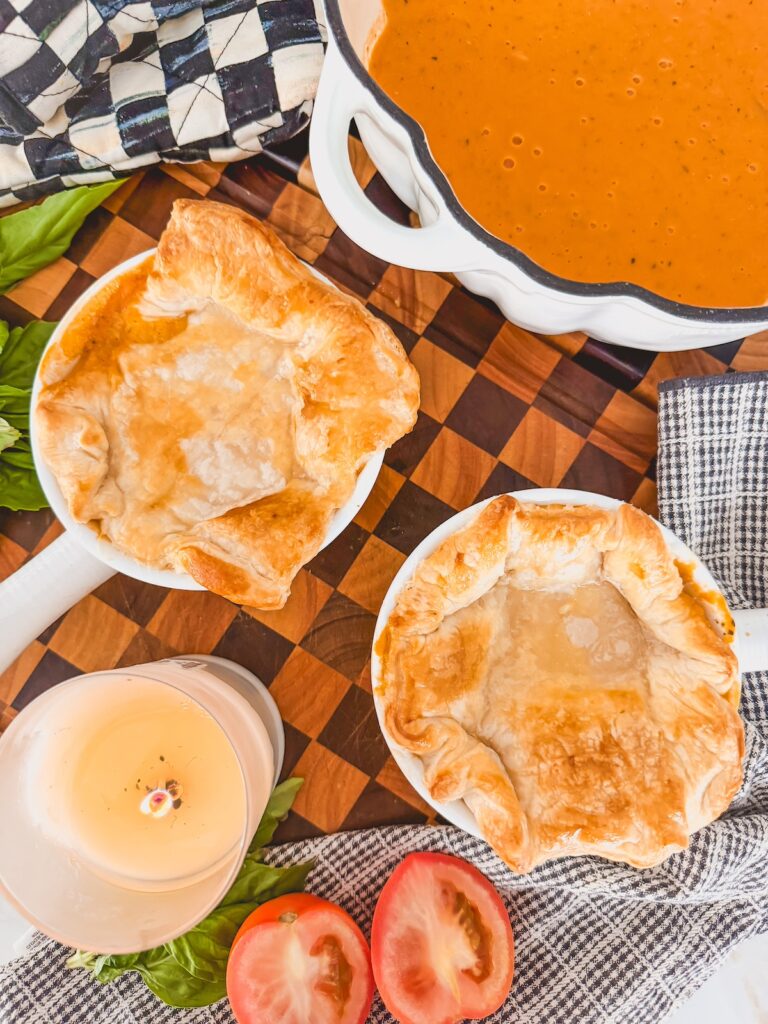 puff pastry baked on top of roasted tomato soup 