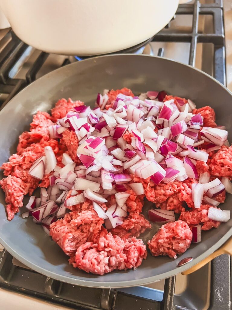 ground beef and onion in skillet