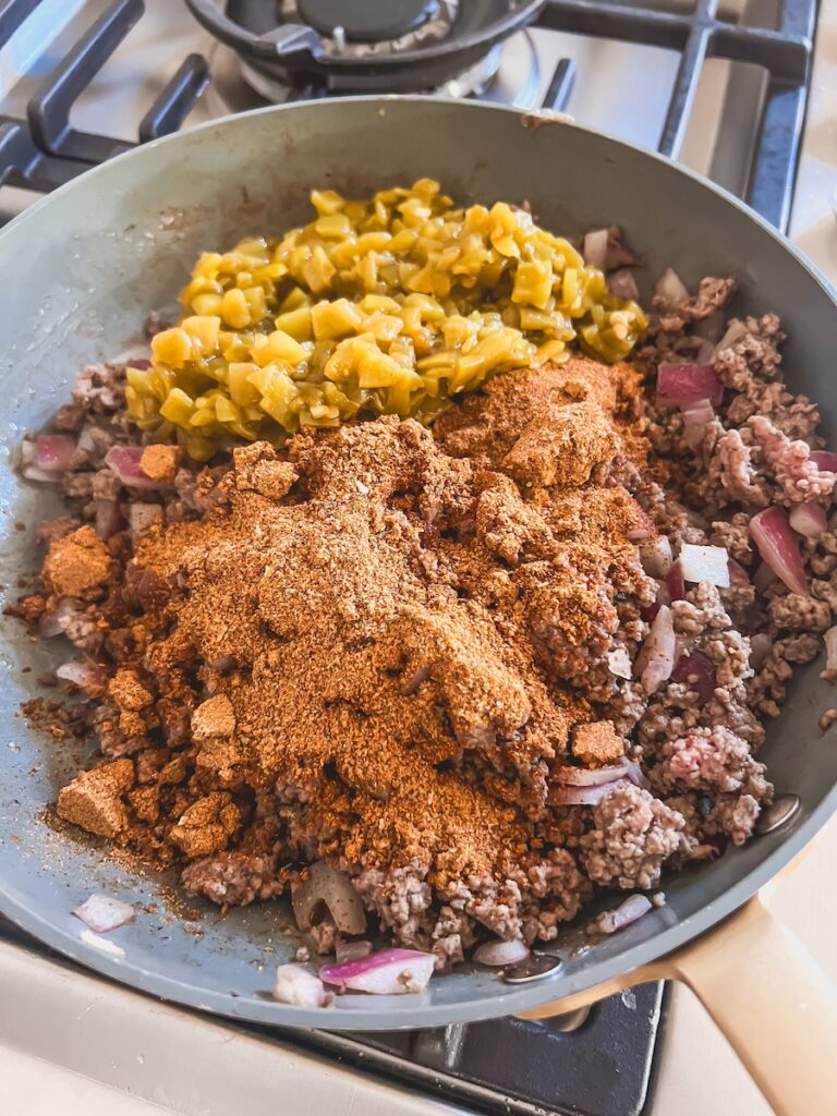taco seasoning added to beef mixture
