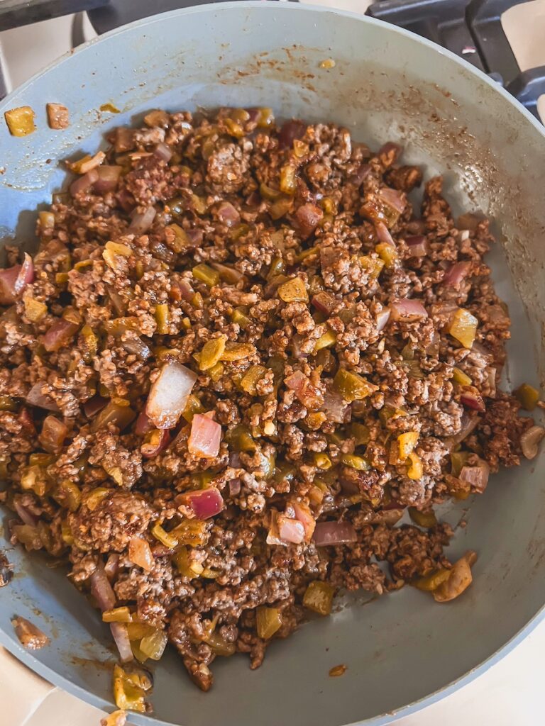taco lasagna beef mixture on skillet