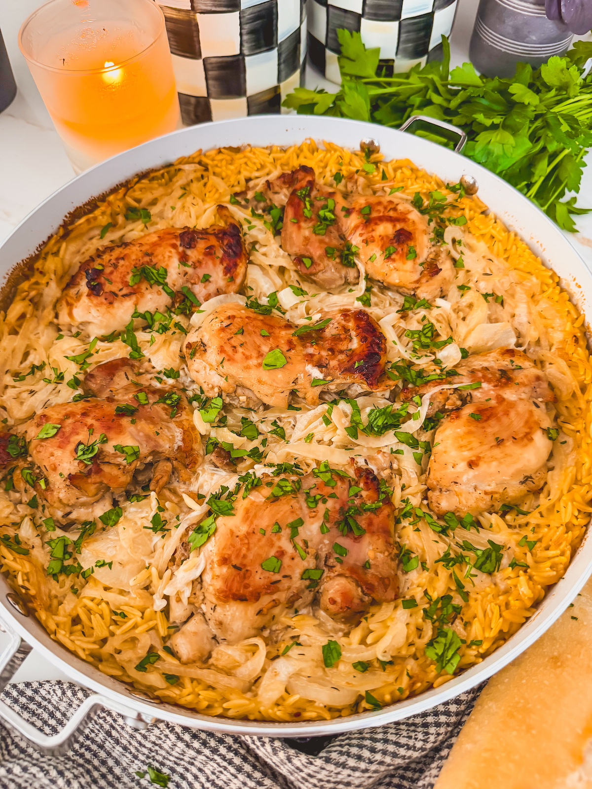 chicken and orzo in a skillet
