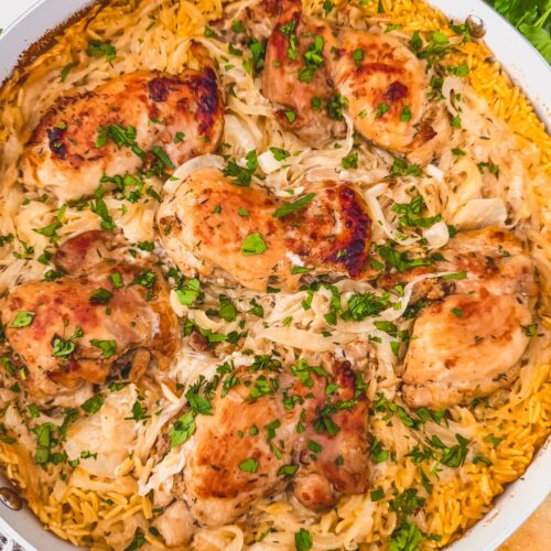 close up of french onion chicken and orzo skillet