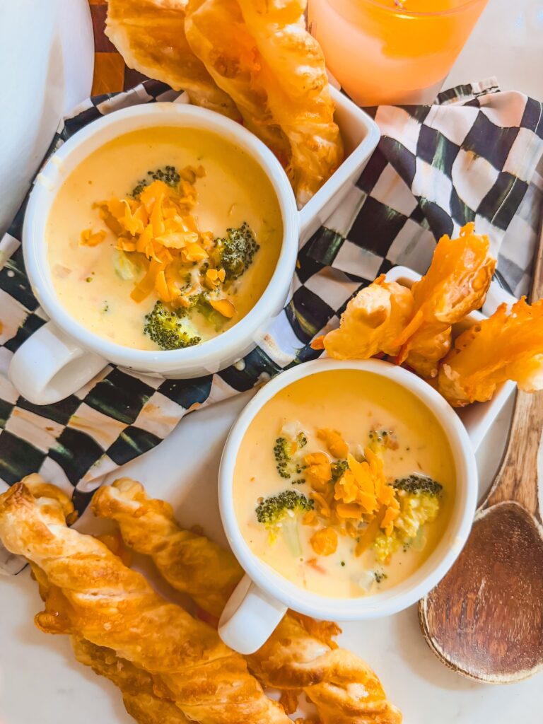 broccoli cheddar soup in soup bowls