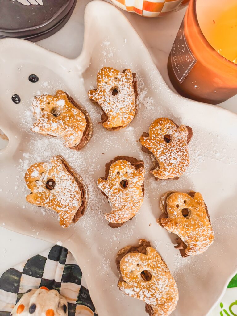 ghost platter with ghost pastries filled with chocolate whipped cream